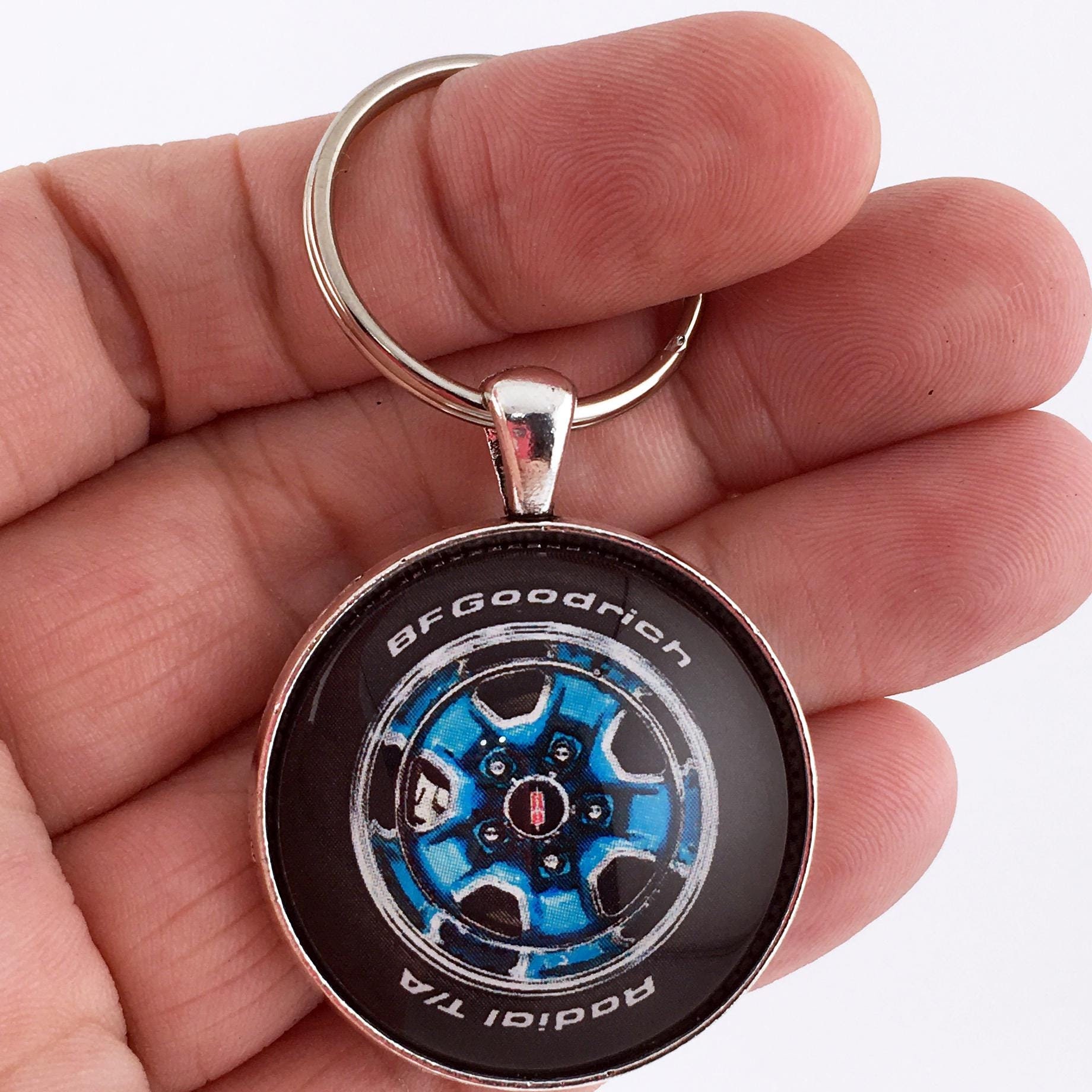 Vintage Oldsmobile Cutlass Supreme Viking Blue Rally Wheel 1.2" Diameter Keychain