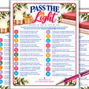 May include: A printed game sheet titled Women's Ministry Pass The Light featuring a numbered list of twenty rhyming verses, floral borders, a graphic of a glowing lamp, a gift box, and a Holy Bible, with a pink pen resting at the bottom right corner.