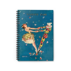 Op de afbeelding: Een vintage Vanity Fair-magazinecover uit februari 1931 met een vrouw in een witte jurk en een man in een narrenkostuum die dansen tegen een blauwe achtergrond met roze bloemen. De tekst op de omslag luidt "Vanity Fair" en "Februari 1931, Prijs 35 cts."