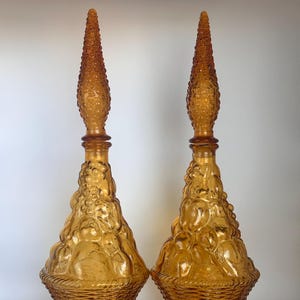 Pair of Mid Century Modern Italian Empoli Amber Glass Genie Bottle Decanter