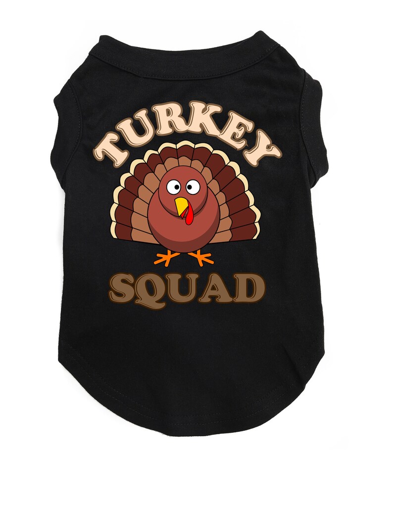 May include: Black dog shirt with a brown turkey graphic and the text "TURKEY SQUAD".