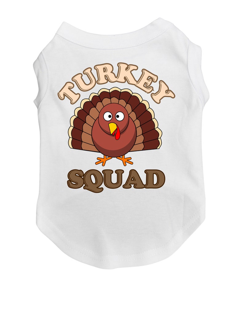 May include: White sleeveless dog shirt with a brown cartoon turkey and the text "TURKEY SQUAD" in brown letters.