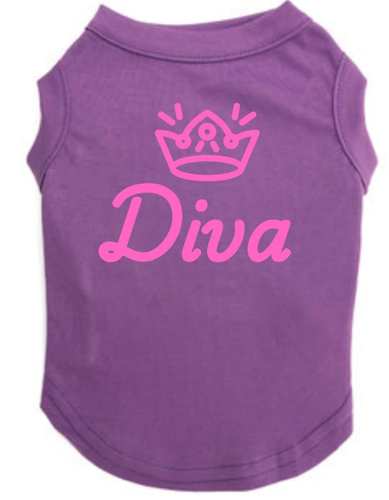 May include: Purple dog t-shirt with a pink crown graphic and the word "Diva" in a cursive font. The t-shirt is sleeveless and made of a soft material, designed for comfort and style.