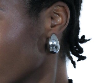 Stainless Steel Teardrop Earrings: Polished Silver Hollow Design