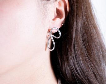 Silver Titanium Steel Curvy Line Earrings: Modern Geometric Studs