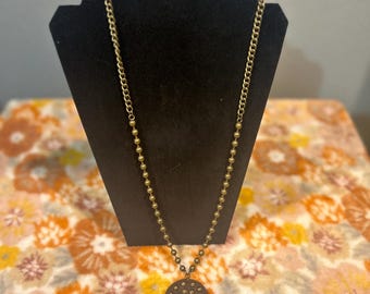 Collar con dijes vintage