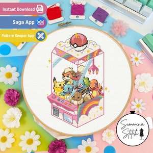 Pode incluir: Um padrão de ponto cruz de uma máquina de garras cheia de personagens Pokémon. A máquina de garras é rosa e tem um design de arco-íris. Os personagens Pokémon incluem Pikachu, Charmander, Squirtle, Bulbasaur e Eevee.