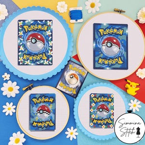 May include: Four cross-stitch projects featuring the back of a Pokemon trading card, displayed in circular wooden and scalloped blue frames. Each piece depicts the iconic blue swirl, red and white Pokeball, and yellow Pokemon logo text.