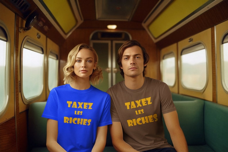 May include: Two people wearing t-shirts with the text "TAXEZ LES RICHES" in yellow letters on a blue and brown shirt.