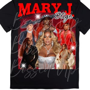 May include: Black t-shirt featuring a graphic of Mary J. Blige and other women in various outfits. The text "MARY J Blige" is printed in red and white across the top. The shirt has a crew neck and short sleeves.