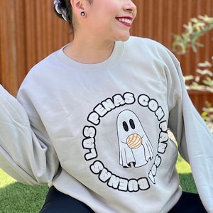 Halloween Sweater for Latina Community / Ghost Eating Pan Dulce / Las Penas con Pan Son Buenas / Conchita Design