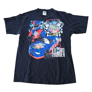 Vintage 1990s Texas Thunder Interstate Batteries 500 Nascar Graphic T-shirt.