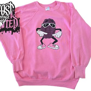 vintage 1980s California Raisins Grapevine Sweatshirt.