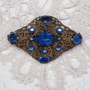 Antique Art Deco Czech Filigree Large Brass Brooch with Sapphire Blue Crystal Rhinestones. 