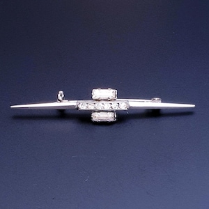 Art Deco Antique Bar Brooch in Silver tone with Baguette and Diamond Cut Clear Stones. Signed Made in Austria.