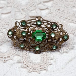 Antique Art Deco Czech Filigree Brass Brooch with Light Green Crystal Rhinestones. 