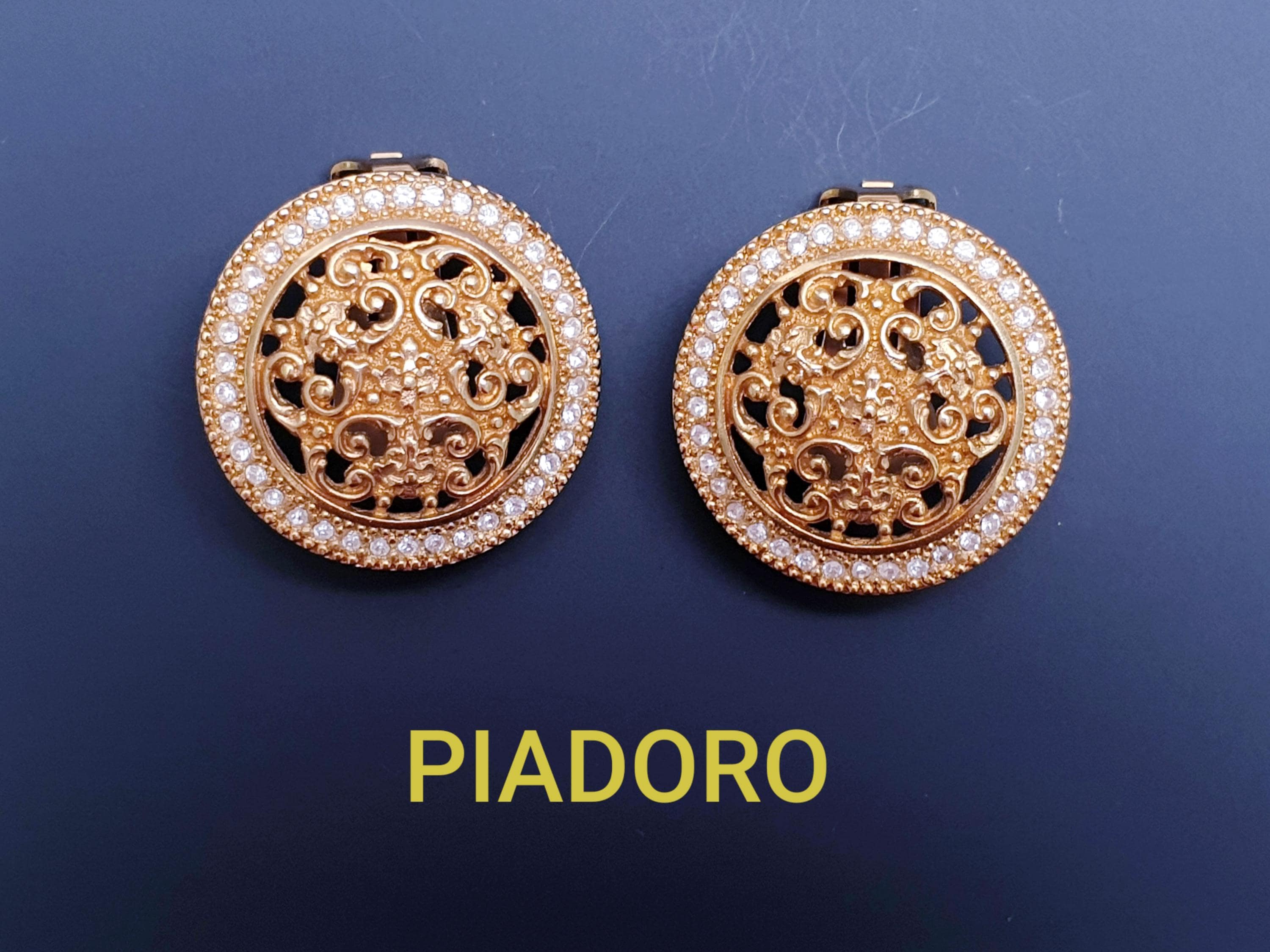 PIADORO RARE Vintage Large Circle Gold plated Openwork Clip-on Earrings with Clear Rhinestones.