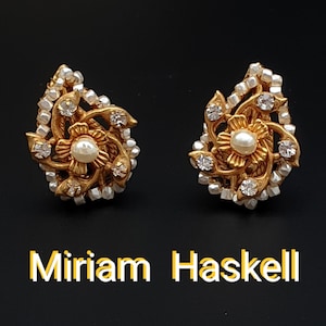 Miriam Haskell Vintage Clip on Earrings in Gold tone with Faux Baroque Pearls, Seed Pearls and Clear Rhinestones. Signed HASKELL.