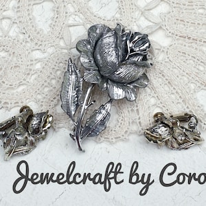 Jewelcraft by Coro Vintage Silver tone Rose Brooch and matching Clip-on Earrings Set. Signed Jewelcraft. 1950s
