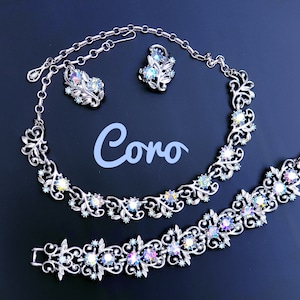 Coro Vintage Parure. Necklace, Bracelet  Clip-on Earrings Set Rhodium Plated with Blue AB Rhinestones. Full Signed.