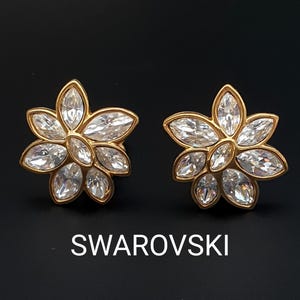 Swarovski Vintage Flower Clip-on Earrings Gold plated with Marquise Cut Clear Crystals. Swan Logo and Signature.