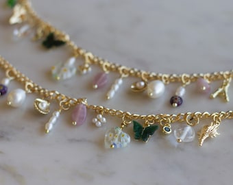 The Lavender Haze Charm Bracelet with Gold Seashell charms, Freshwater Pearls, Amethyst Gems & Gold Plated Figaro Chain (or Curb Chain)