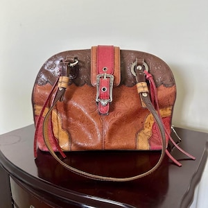 M.C. Marc Chantal embossed floral handbag