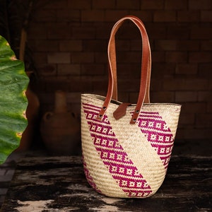 handmade bag with floral detail in pink stripes and long leather handles