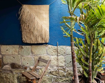 capizayo, traditional palm cape, which you can use as decoration for your living room, bedroom or as a clothing accessory.