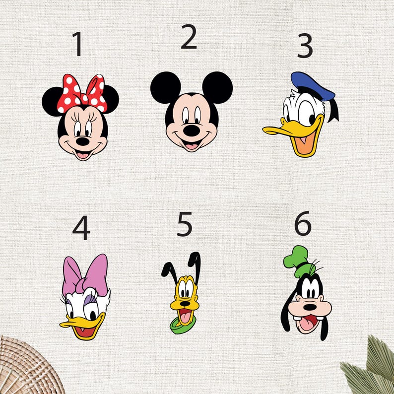 May include: A collection of six cartoon character faces. Minnie Mouse with a red polka dot bow, Mickey Mouse, Donald Duck in a blue sailor hat, Daisy Duck with a pink bow, Goofy, and Pluto with a green collar.