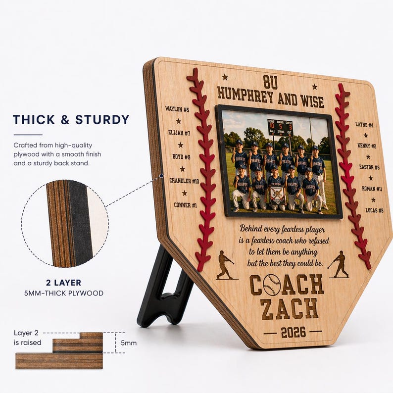 May include: A wooden baseball-shaped photo frame with a team photo. The frame has a natural wood finish, red stitching, and player names. Text includes "Coach Zach - 2026" and team details. The frame is 5mm thick.