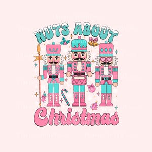 May include: A retro-style graphic featuring three pink and teal nutcracker soldiers with the text "Nuts About Christmas." The design includes snowflakes, a candy cane, and other holiday elements on a light pink background.