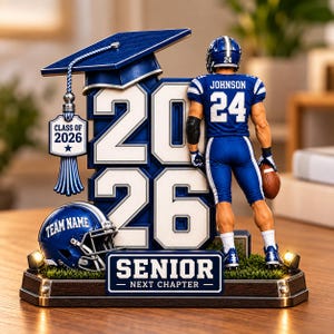 May include: A decorative display featuring a blue graduation cap, the year 2026, and a football player figurine wearing a blue jersey with JOHNSON 24. Includes a blue helmet labeled TEAM NAME and a sign reading SENIOR NEXT CHAPTER.