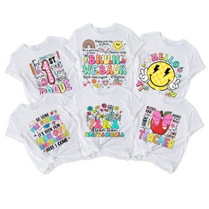 May include: Set of six white t-shirts with colourful, fun, and inspirational text and graphics for teachers and students. The shirts feature phrases like "First Grade", "So Long Pre-School", "Bruh We Back", "Hello", "Para Dream Team Professional", and "Blessed Kind Love Guide Teacher".
