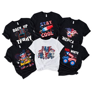 May include: Six black and white t-shirts with red, white, and blue patriotic designs. The designs include "Back Up Terry", "Stay Cool", "'Merica", "America", "Red, White, Boom", and a cartoon taco wearing a Uncle Sam hat.