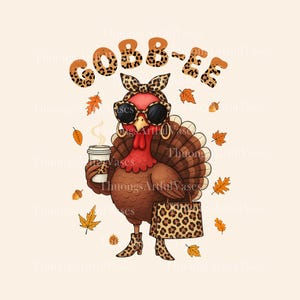 May include: A cartoon illustration of a turkey wearing sunglasses, a leopard print headband, and boots, holding a coffee cup and a purse. The text "GOBB-EE" is above the turkey. Autumn leaves and acorns are scattered around the turkey.