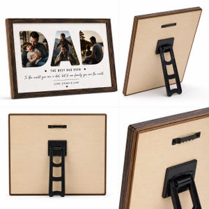May include: A wooden picture frame with the word "DAD" cut out, revealing three family photos. The frame has a dark brown finish and includes the text "THE BEST DAD EVER" and a personalized message. It has a black easel back.