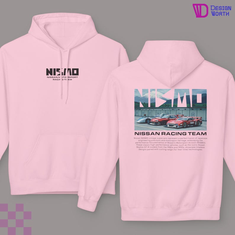 May include: A light pink hoodie featuring the text "NISMO" in black on the front and a graphic of race cars with the text "NISSAN RACING TEAM" on the back. The hoodie has a drawstring hood and a kangaroo pocket.