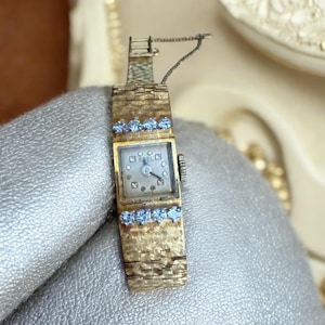 Vintage estate 18kt yellow gold and diamond ladies Ebel petite cocktail evening jewelry watch.   Working condition.  Perfect  wedding gift
