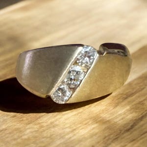 Vintage estate 14 karat yellow gold men’s three stone diamond ring band. Perfect gift for wedding, anniversary, birthday or commitment ring