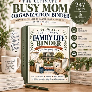 May include: A white binder titled The Ultimate Family Life Binder with a house illustration, surrounded by a mug labelled organised mums happier families, stacked books labelled Plan, Organise, Simplify, Make Memories, and a green pen on a desk.
