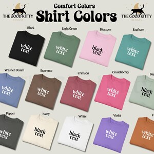 May include: An assortment of Comfort Colors t-shirts in shades like black, light green, and blossom. Each shirt features text in contrasting colours, such as white or black, with the brand logo at the top. The image displays a variety of shirt colours.