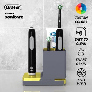Puede incluir: Un juego de cepillos de dientes eléctricos negros y grises con una base de carga. El juego incluye dos cepillos de dientes, un tubo de pasta de dientes y un soporte. La base tiene una parte inferior dorada y el texto "XOHO". La imagen también incluye el texto "Oral-B", "Philips Sonicare" e iconos.