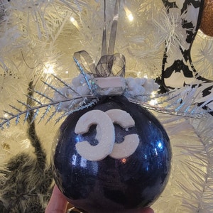 Coco Chanel Christmas tree topper.