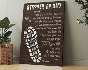 May include: A brown wood-grain background with white text that reads "Stepped Up Dad". The text is followed by a message of appreciation for a stepdad. The message includes the words "Thank you for being the father you didn't have to be". A white footprint graphic is in the center of the image.