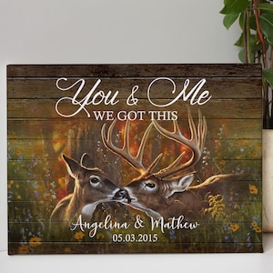 May include: Wooden wall art depicting two deer in a forest scene. The artwork includes the text "You & Me WE GOT THIS" in elegant script, along with the names "Angelina & Mathew" and the date "05.03.2015".