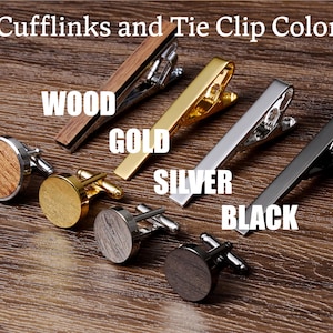 May include: Four pairs of cufflinks and tie clips in different colours: wood, gold, silver, and black. Cufflinks and tie clips are a popular accessory for men.