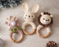 Custom Crochet Toy Rattle, Engraved Wooden Ring for Newborn, Personalized Baby Gift for Christmas or Baby Shower, Handmade with Love product logo