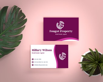 May include: A white business card with a pink and purple design. The card features the text "Hillary Wilson, Real Estate Agent" and contact information. The logo is a white "WS" in a circle.