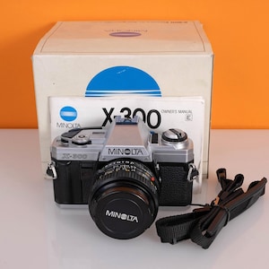 Minolta X300, boxed with original strap and lens cap
